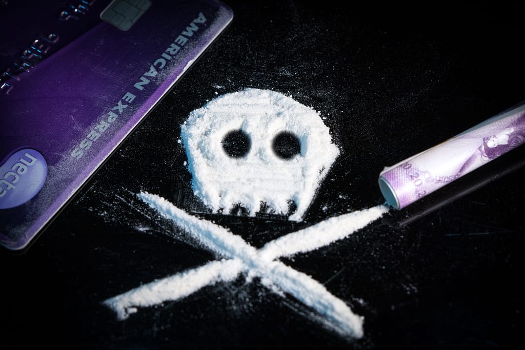 opioid addiction powder in a skull 