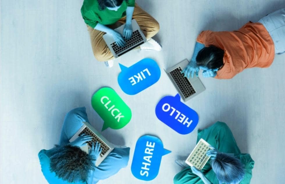 Social Media Addiction: What It Is and What to Do About It 2 Image of four teens sitting in a circle all on computers not speaking or paying any attention to the others.