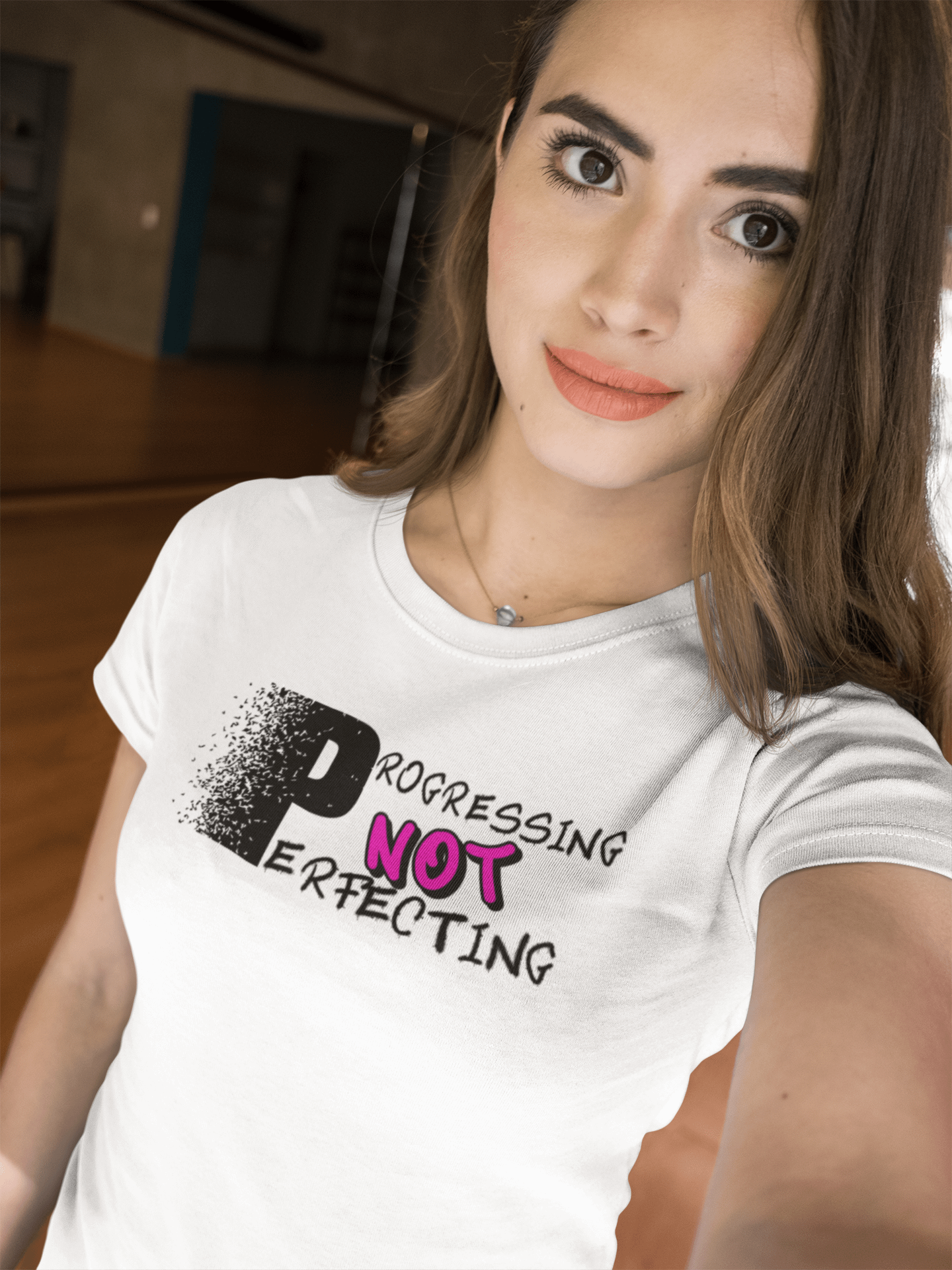 beautiful-woman-taking-a-selfie-mockup-while-wearing-a-round-neck-tee-at-a-studio-a17044 P&P tee