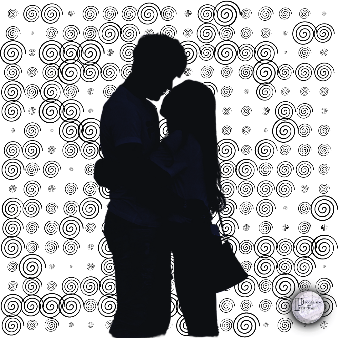 a silhouette of a man and woman kissing
