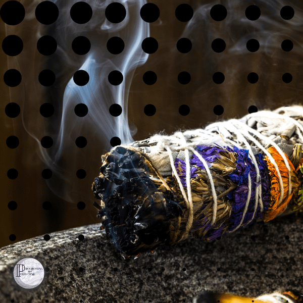 5 a smudge stick with smoke